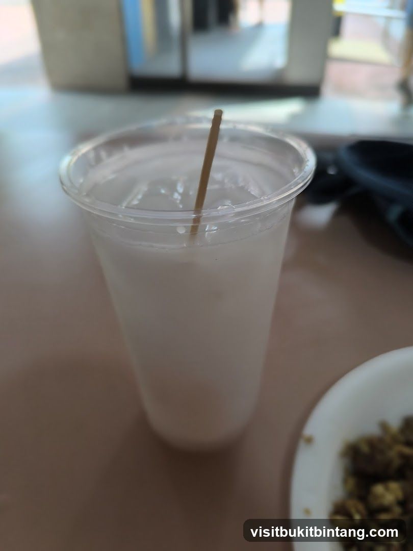 Drink with Ice and Stirrer