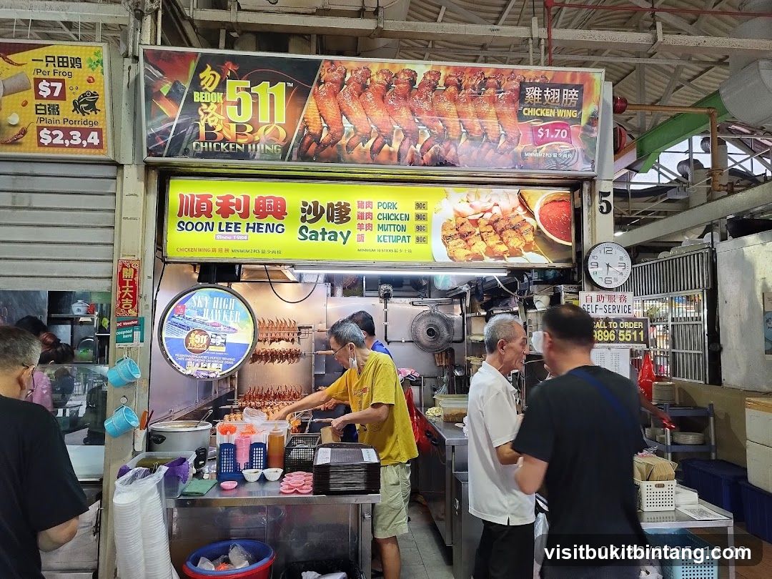Food Stall with BBQ Chicken Wings and Satay