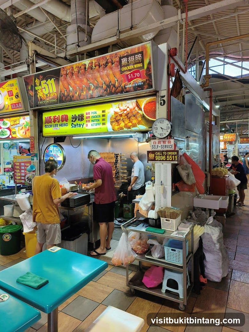 Food Stall with Chicken Wings and Satay