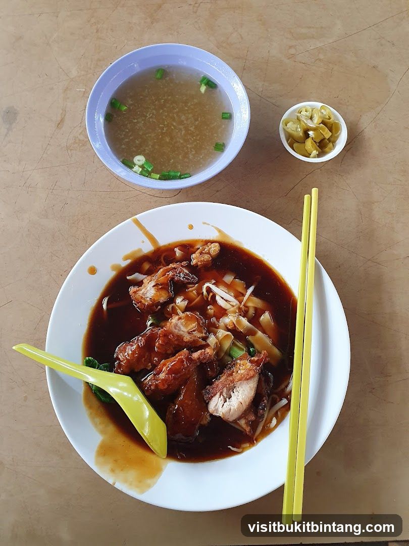 Noodle Dish with Soup and Pickled Chilies