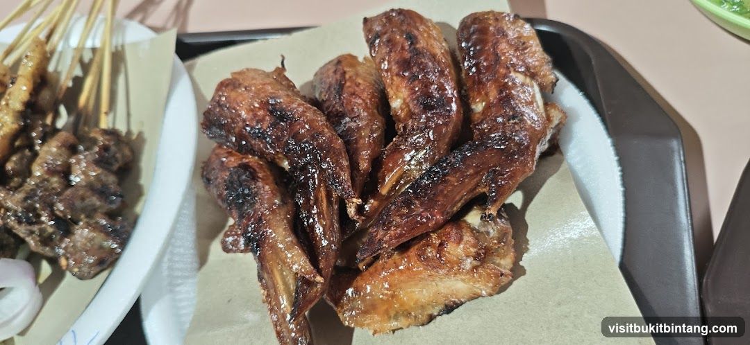 Grilled Chicken Wings and Satay Skewers