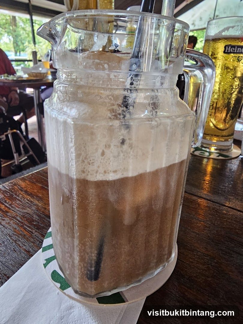 Pitcher of Iced Coffee with Beer in Background