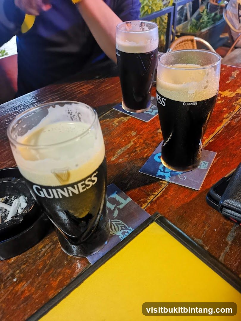 Guinness Beers on a Wooden Table