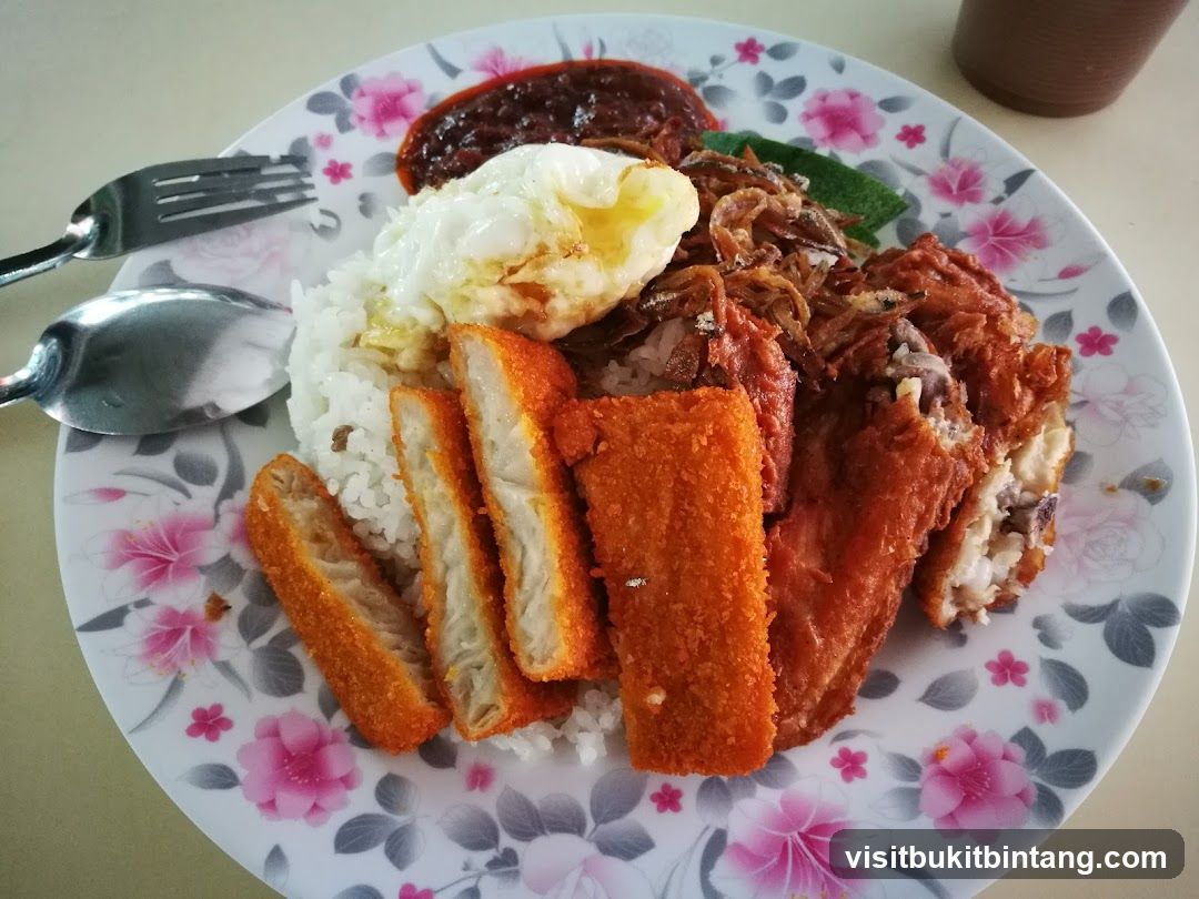 Nasi Lemak with Fried Chicken and Fish Fingers