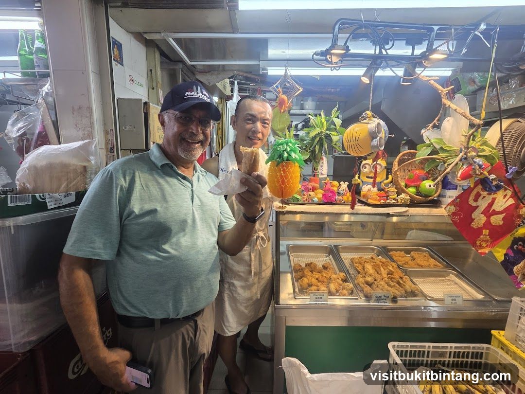 Two Men at a Food Stall
