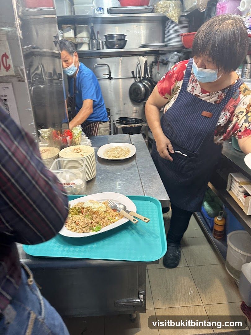 Kitchen Staff Preparing Food