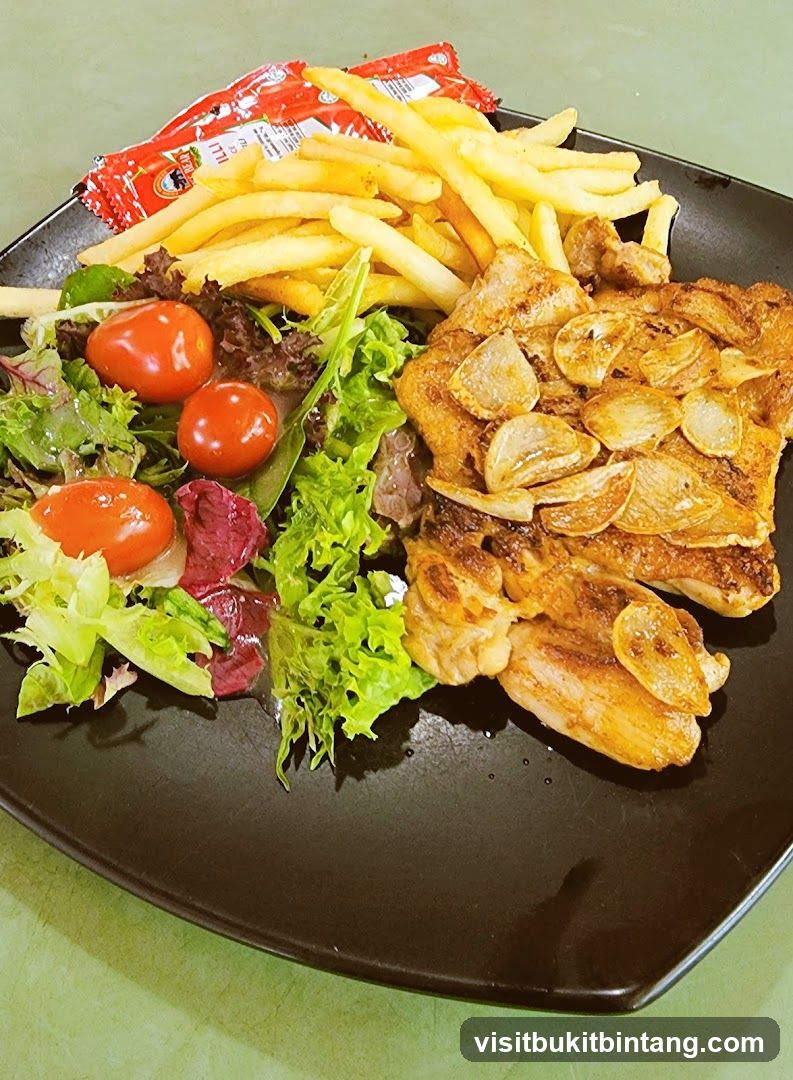 Garlic Chicken Steak with Fries and Salad