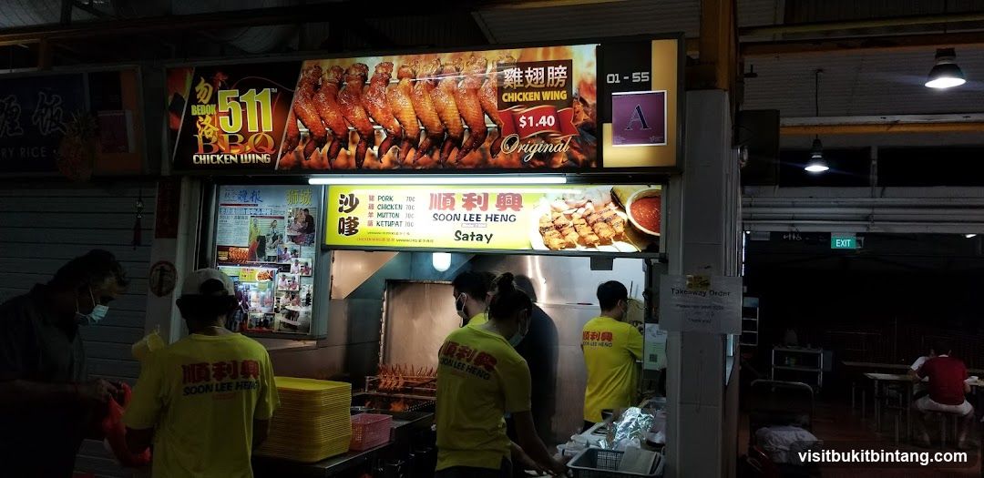 Food Stall with Chicken Wings and Satay