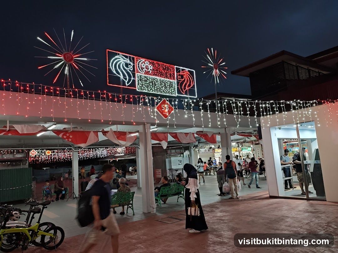 Outdoor market with festive lights