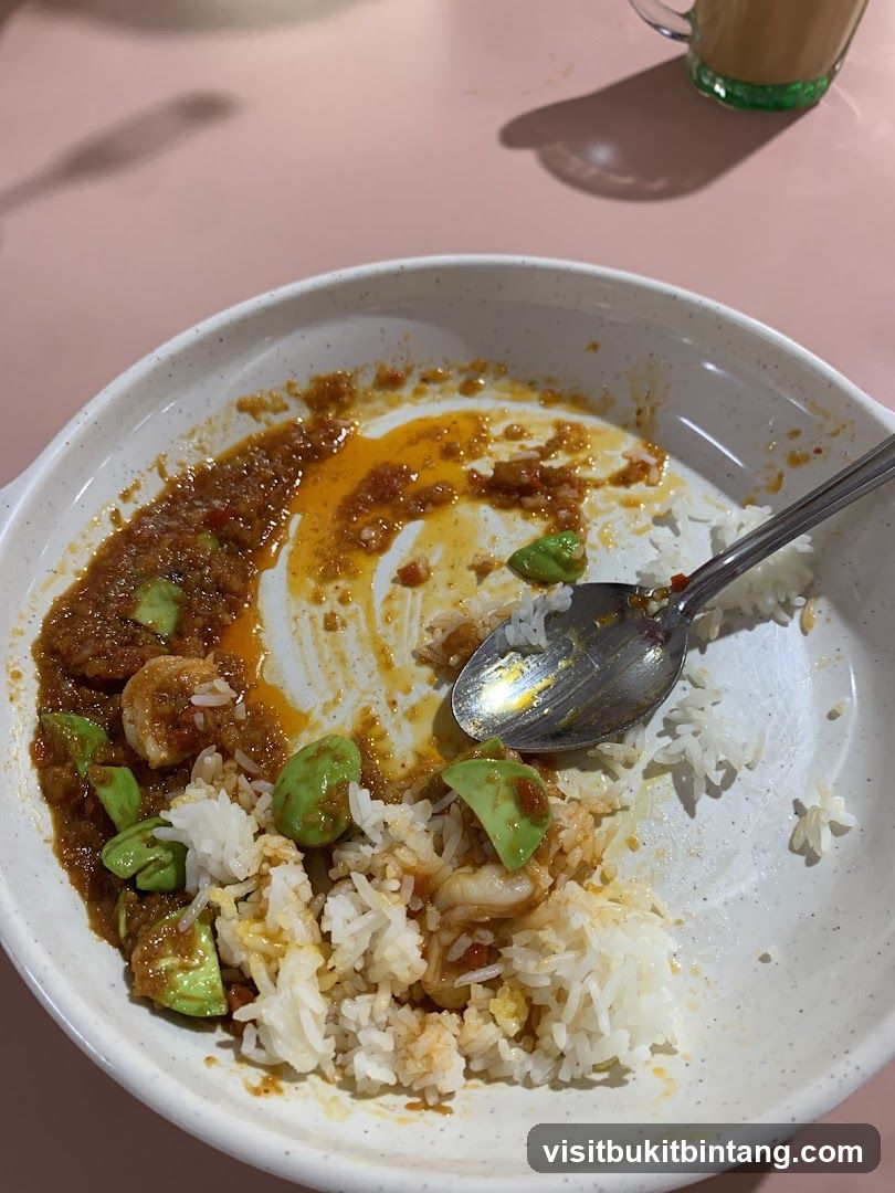 Partially Eaten Meal with Petai and Rice