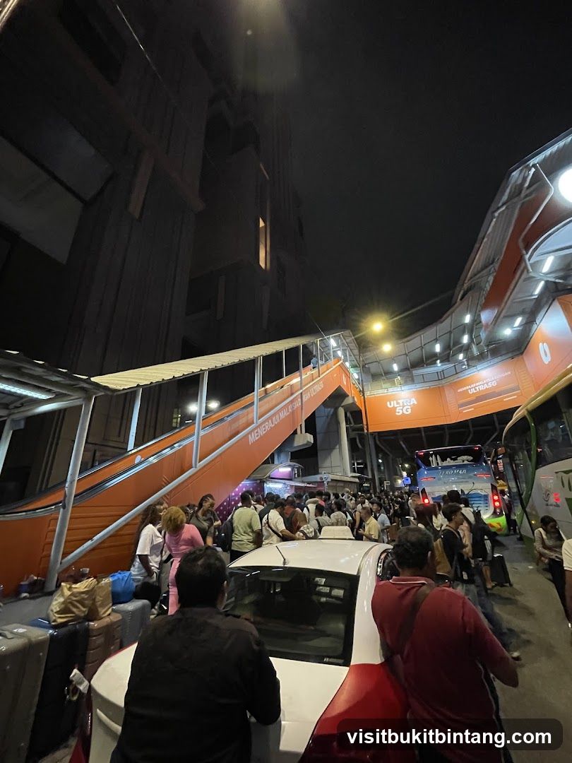 Crowded Bus Station at Night