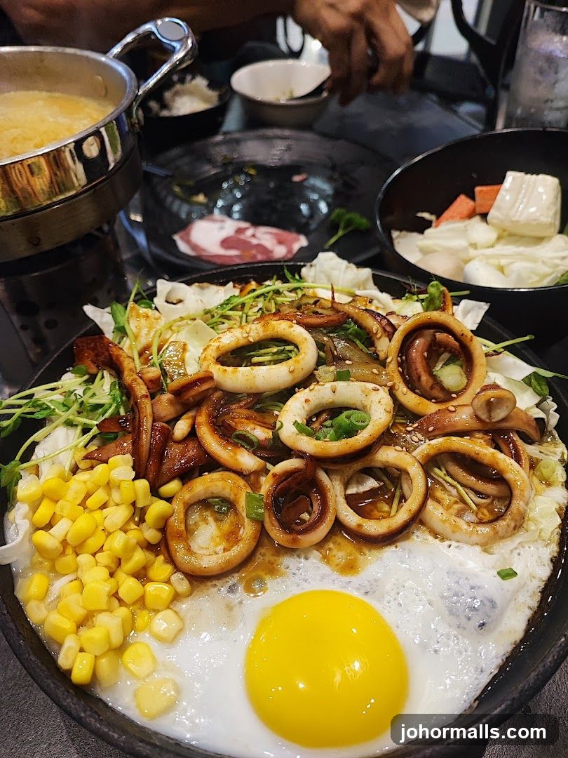 Sizzling Squid and Egg Dish
