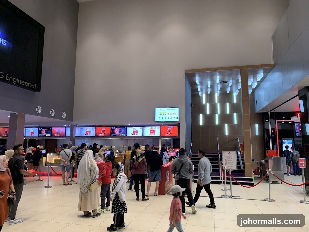 People queuing at a cinema concession stand
