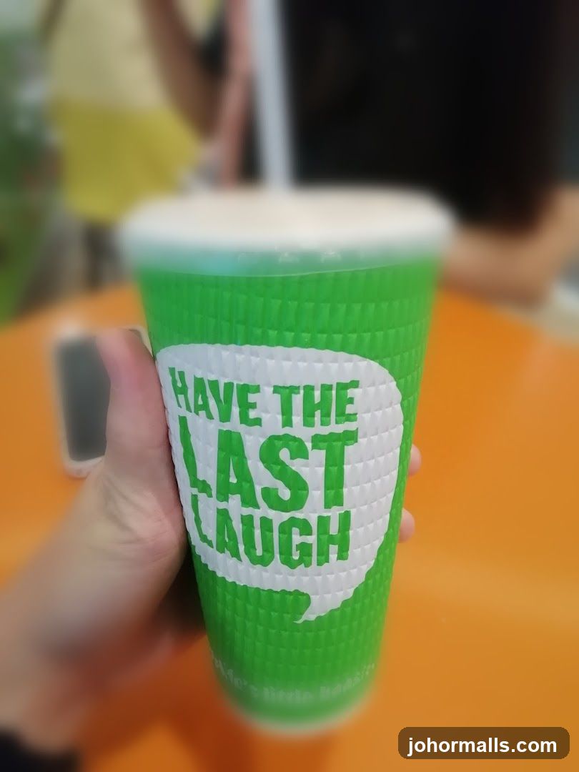 Green cup with text
