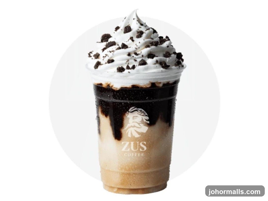 Iced Coffee Drink with Whipped Cream and Cookie Crumbles