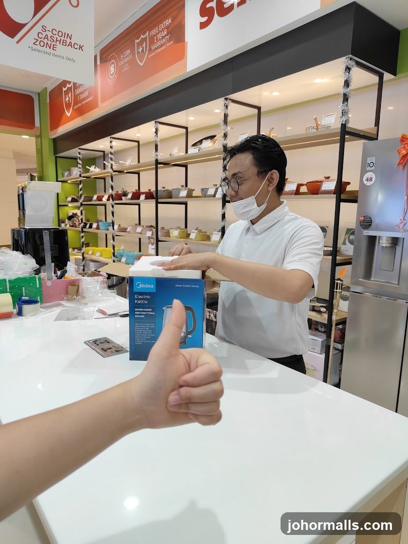 Salesperson with Electric Kettle
