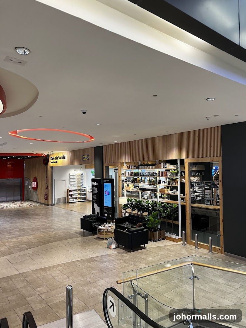 Interior of a shopping mall with storefronts