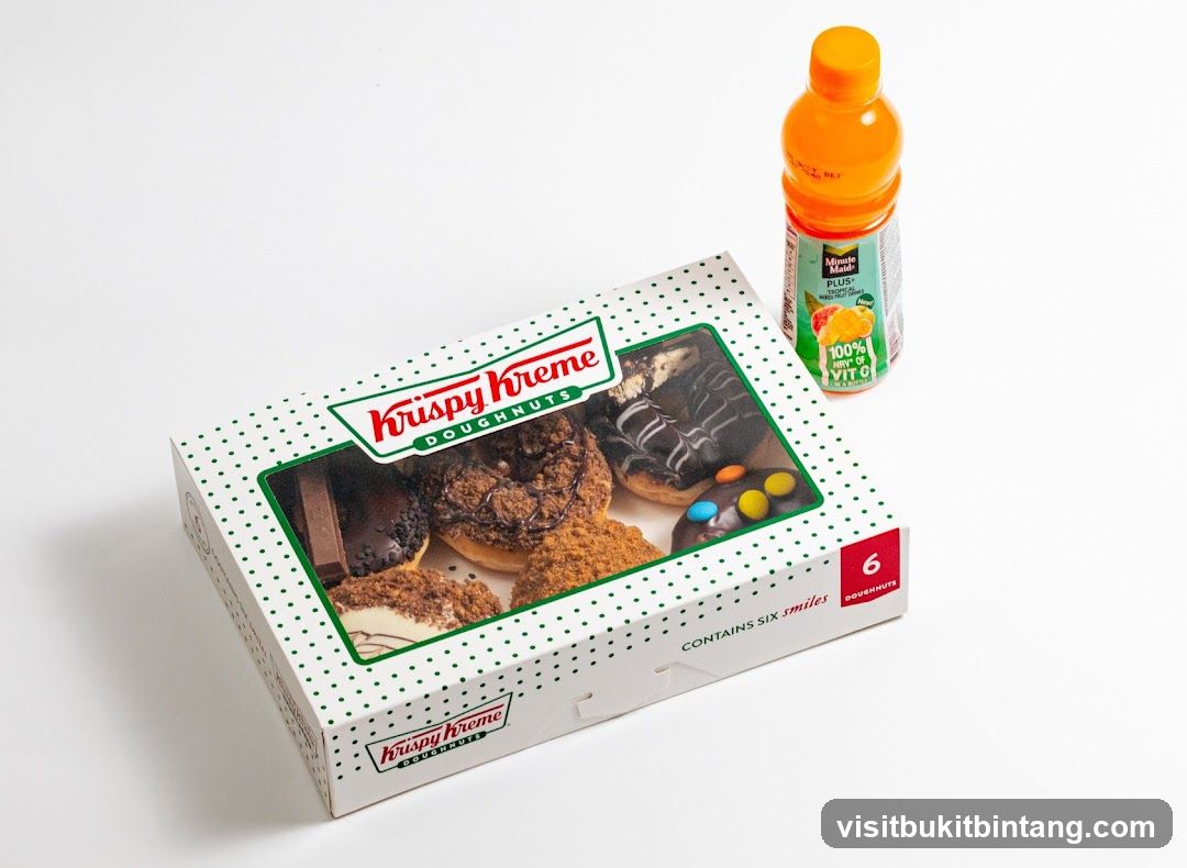 Krispy Kreme Doughnuts Box and Orange Drink
