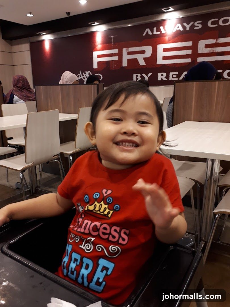 Child in restaurant interior