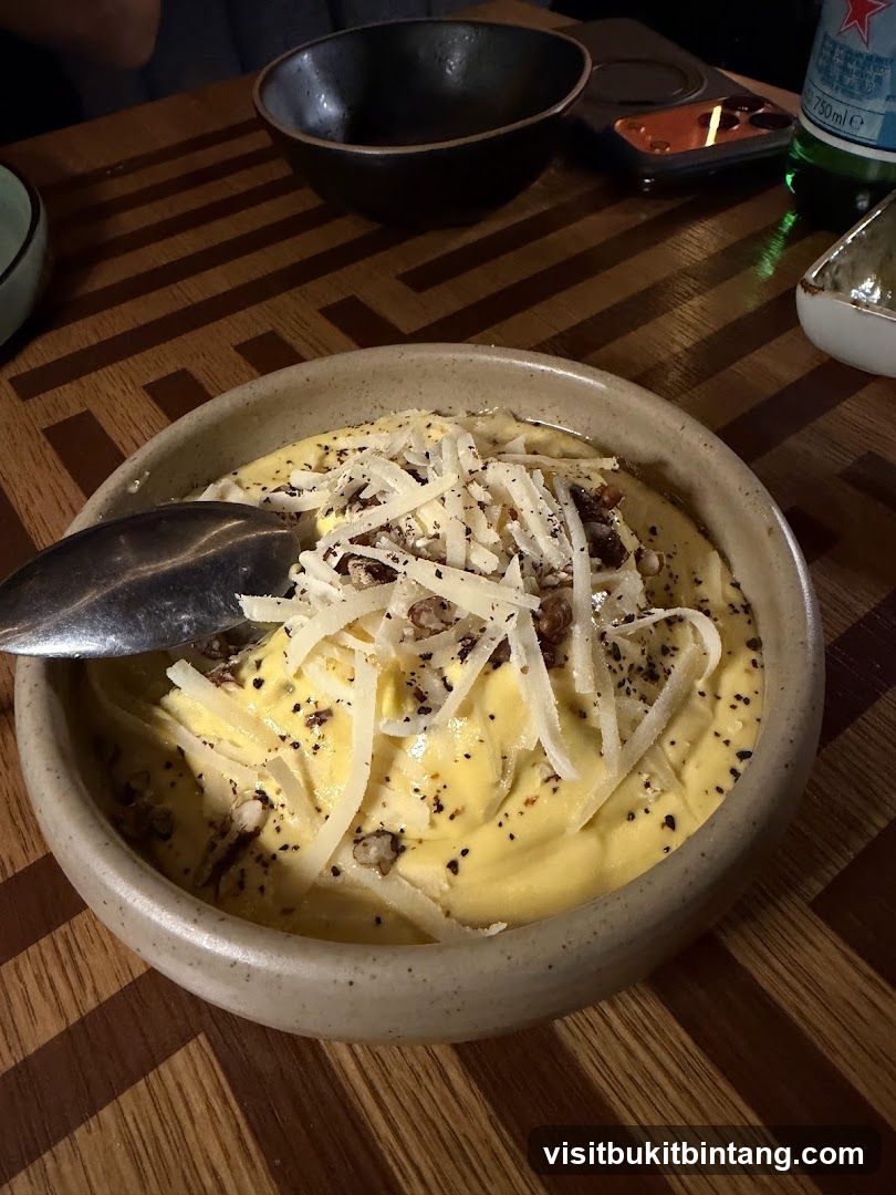 Creamy Dish with Grated Cheese and Nuts