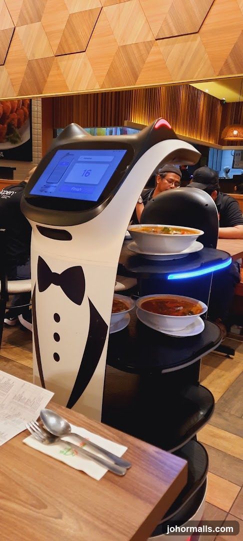 Robot Waiter Serving Soup