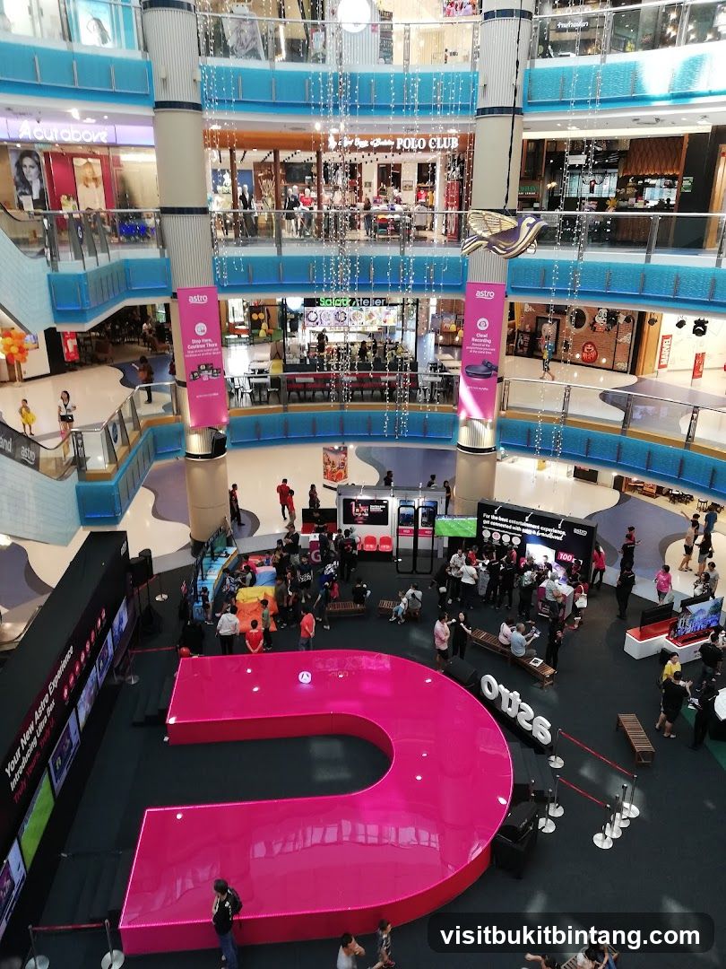 Mall Atrium with Large Pink 'U' Installation
