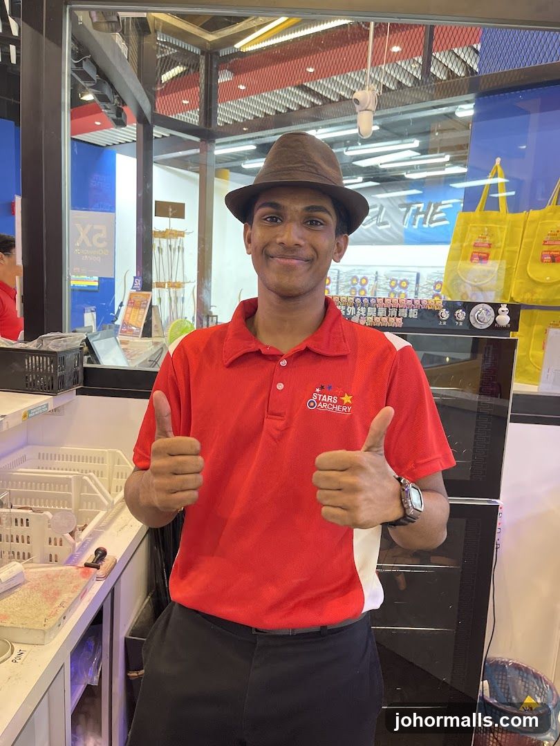 Employee giving thumbs up