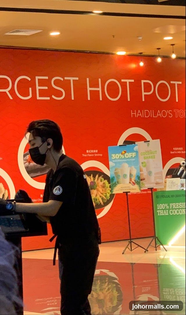 Restaurant Interior with Staff and Promotions