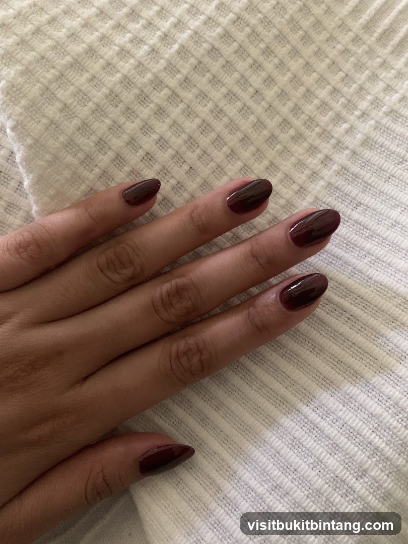 Dark Red Oval Nails