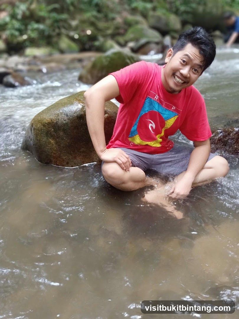 Man sitting in a stream