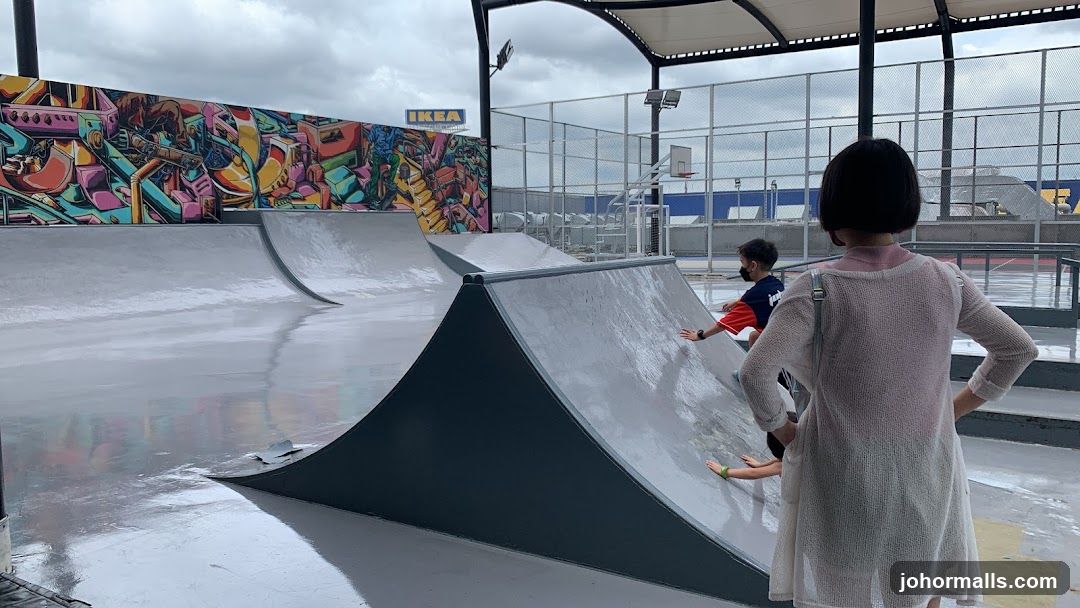 Skatepark with Graffiti Wall and IKEA Signage
