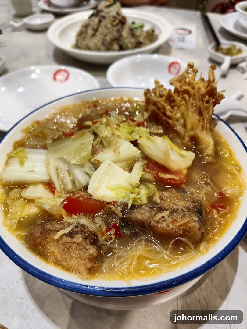 Fish soup with vegetables and noodles