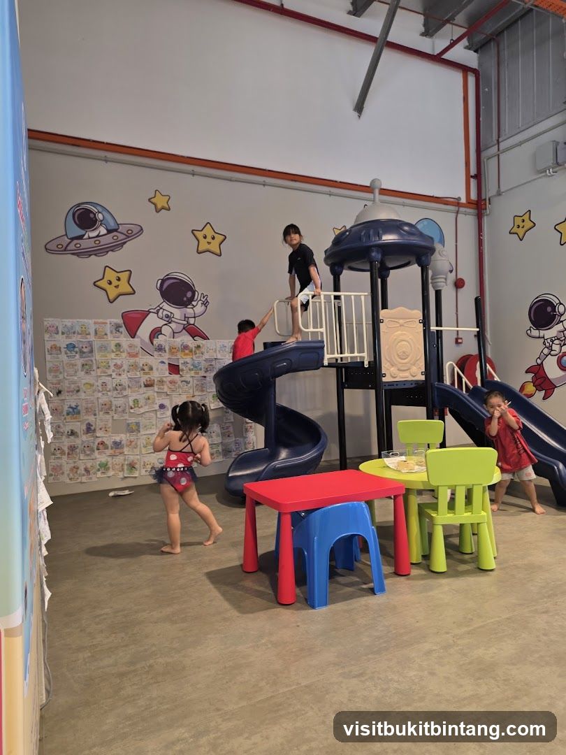 Children Playing in a Space-Themed Indoor Playground