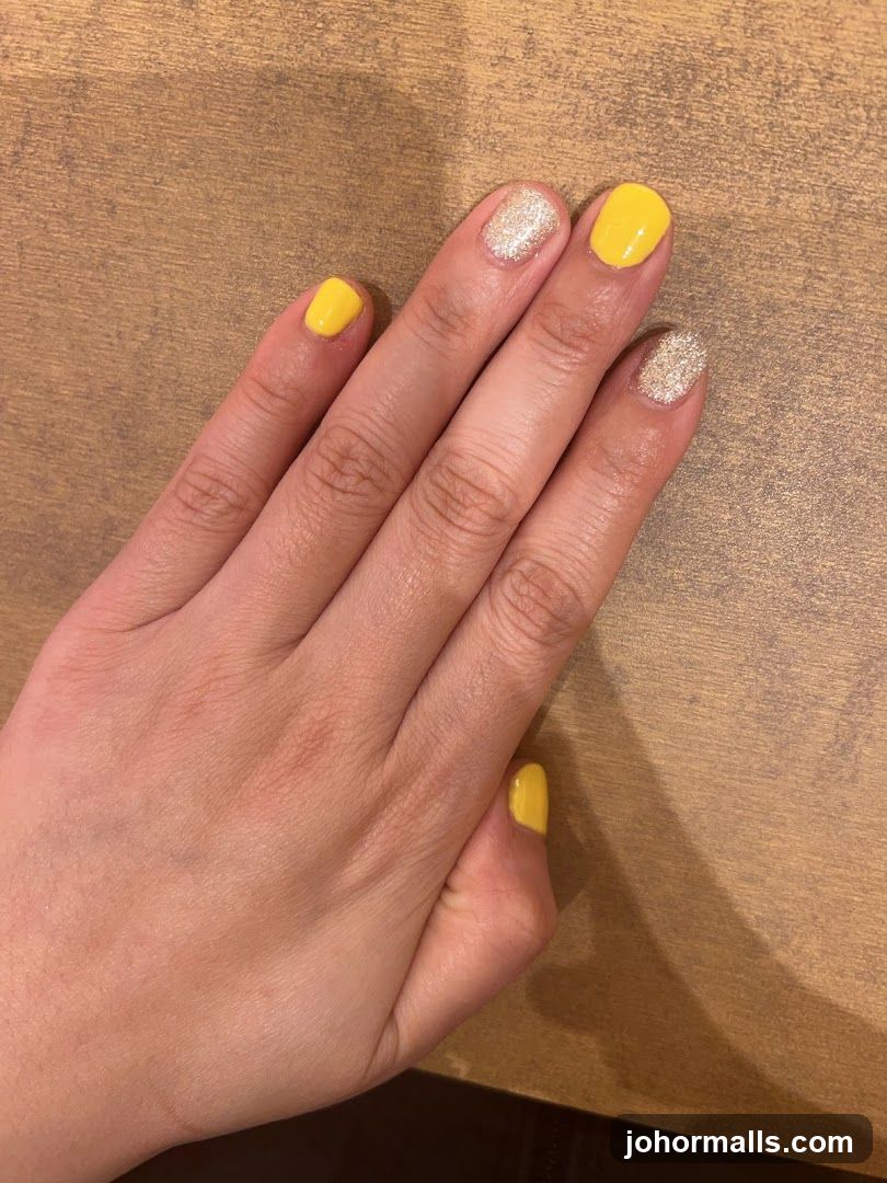 Yellow and Glitter Nails