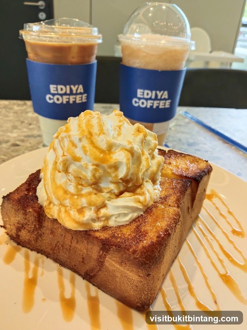 Whipped cream topped toast with caramel drizzle and two iced coffees