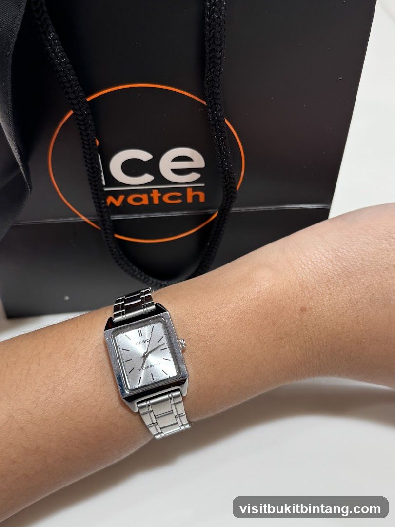 Watch on wrist with shopping bag
