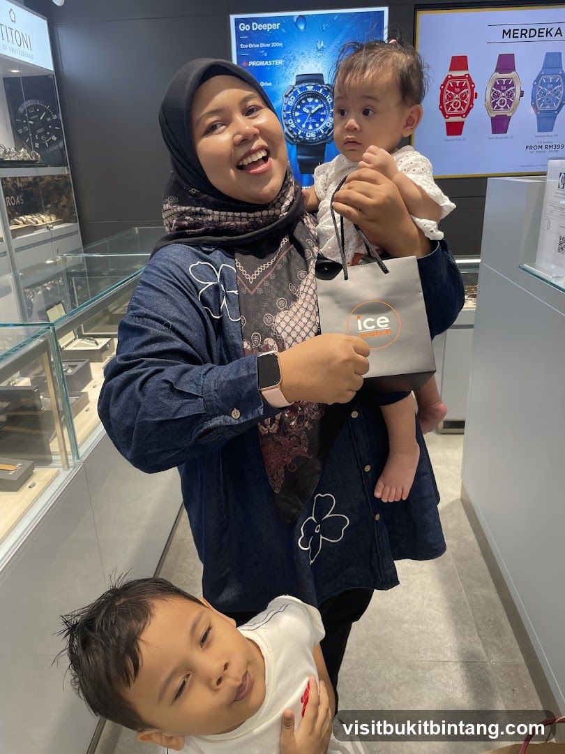 Woman and children in a watch store
