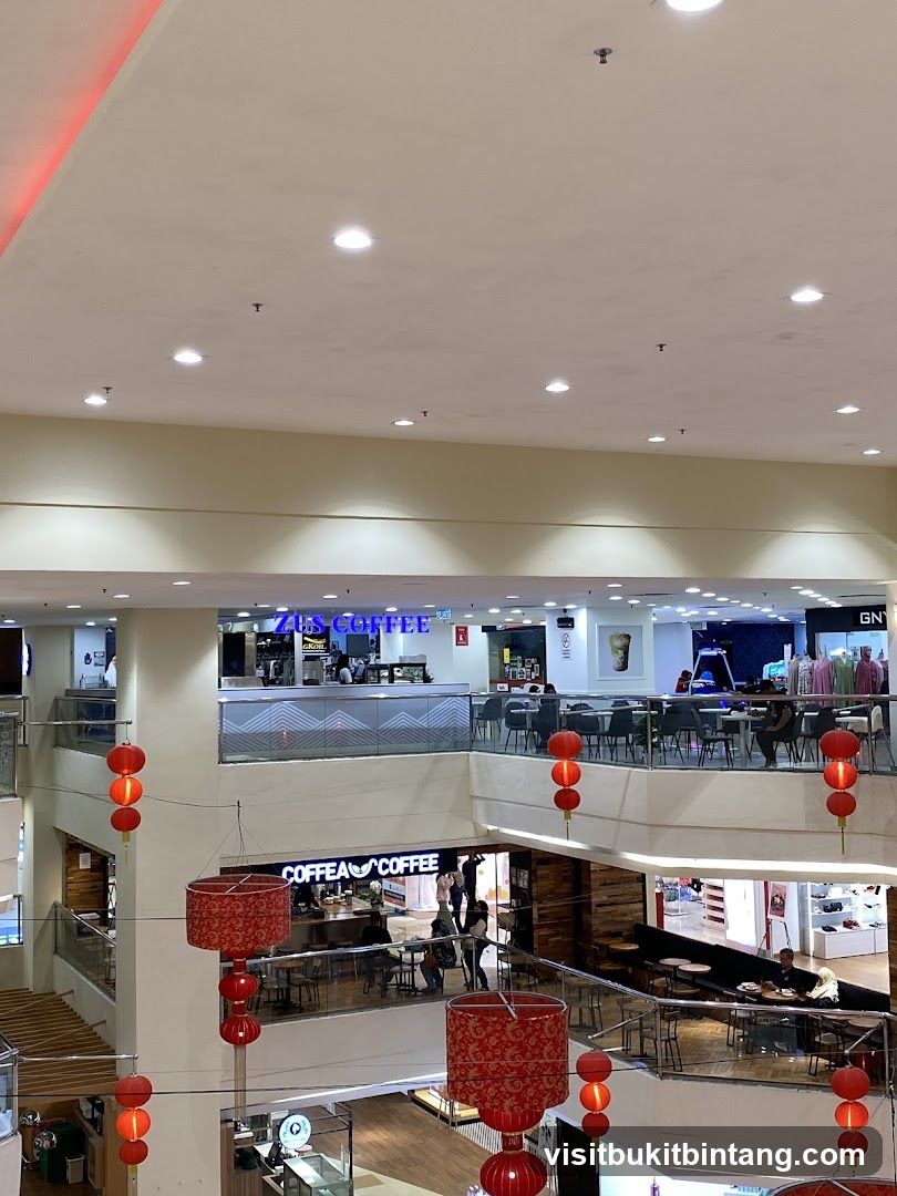 Interior of a shopping mall with coffee shops