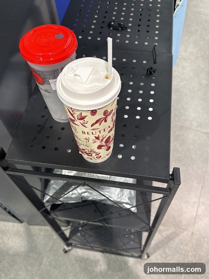Two drinks on a shelf