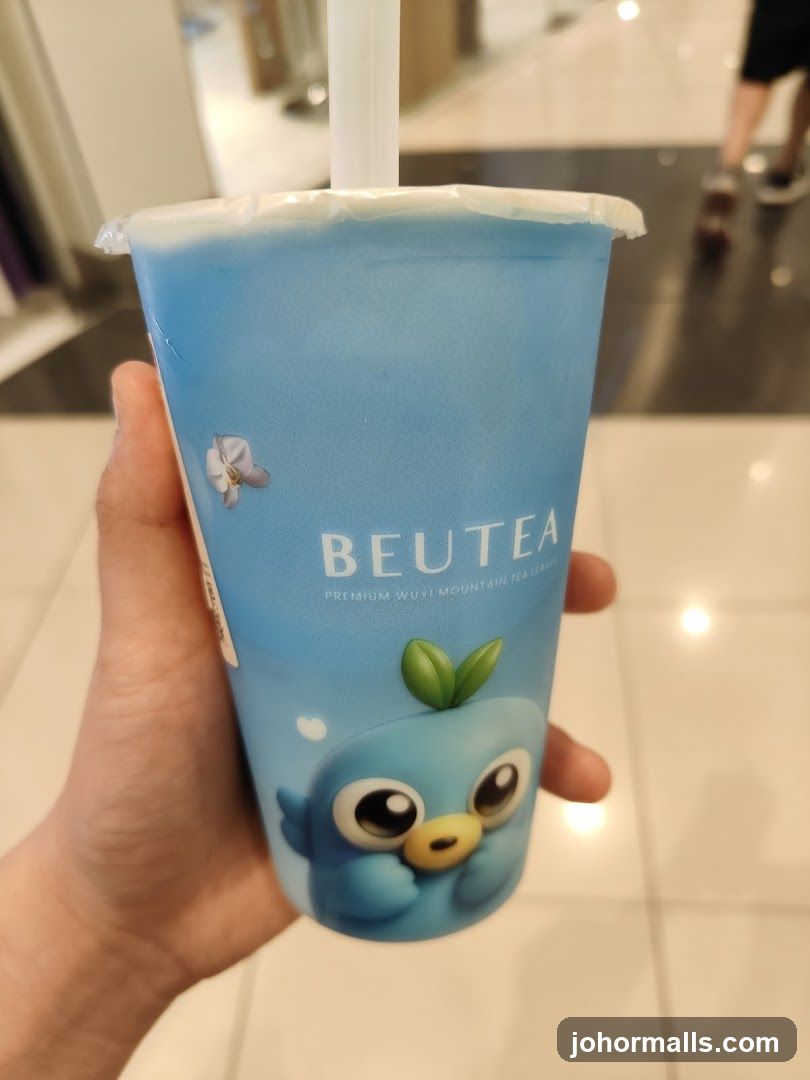 Blue Beverage Cup with Cartoon Bird