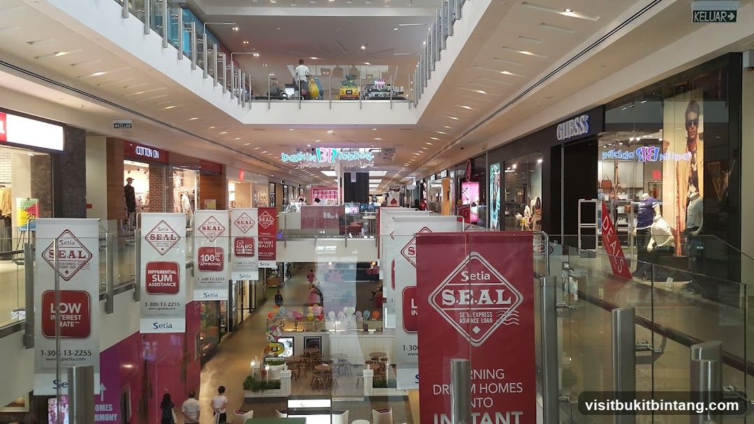 Mall Interior with Storefronts and Banners