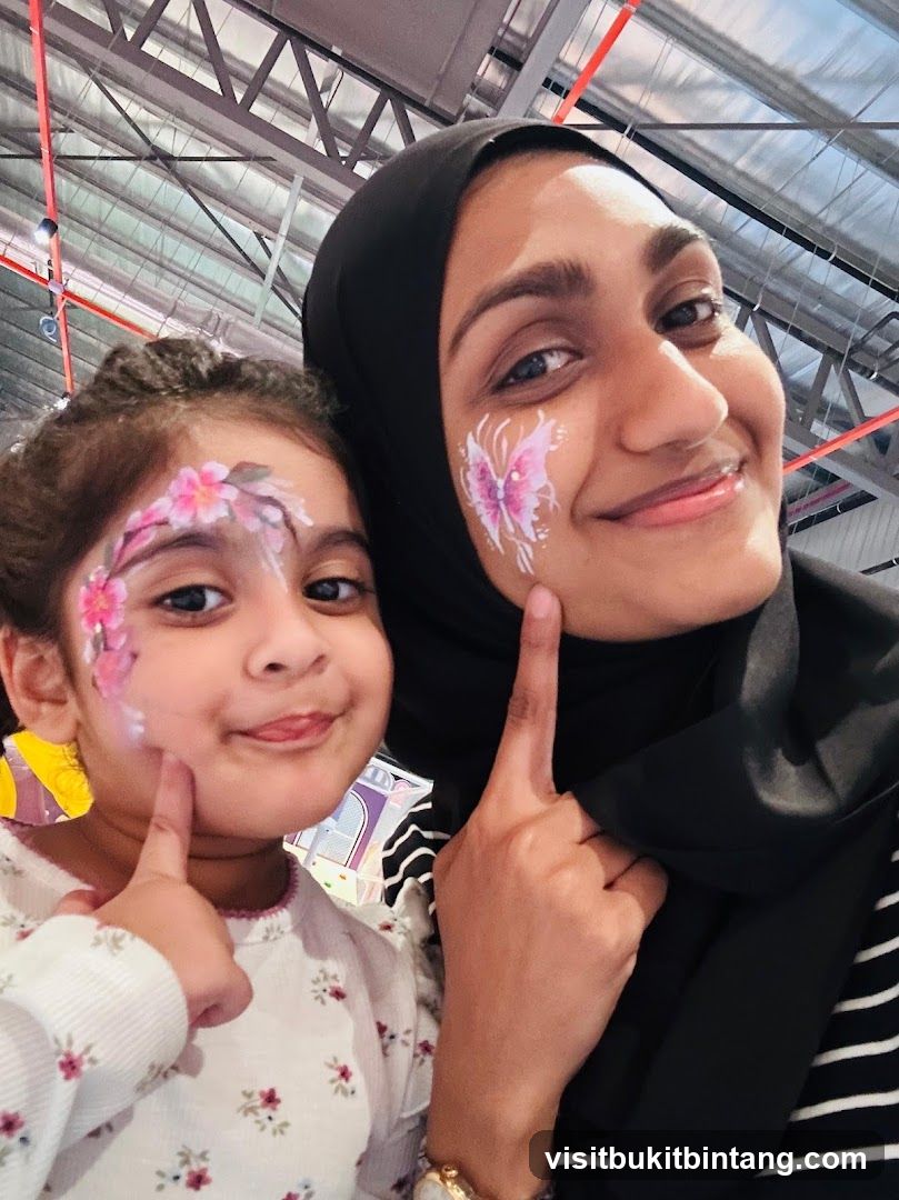 Mother and daughter with face paint