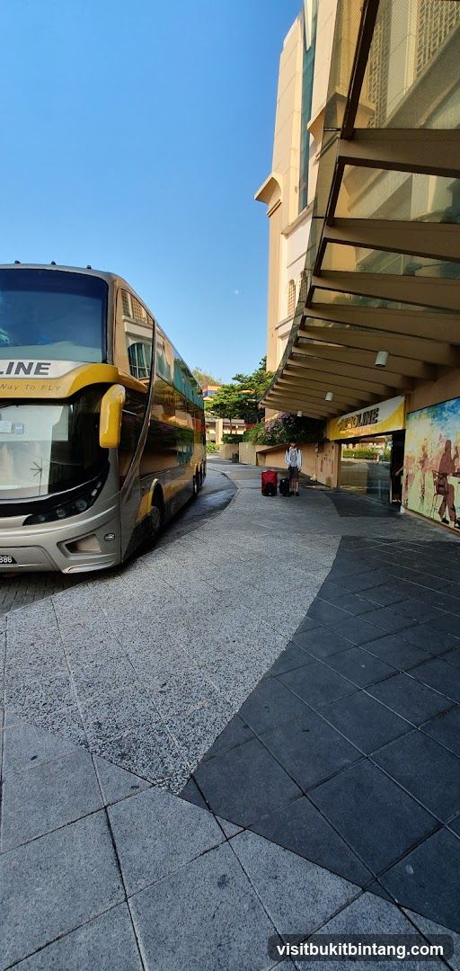 Bus parked near building entrance