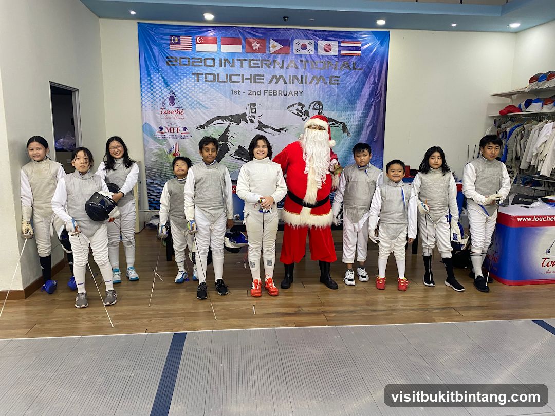 Fencing competition participants with Santa