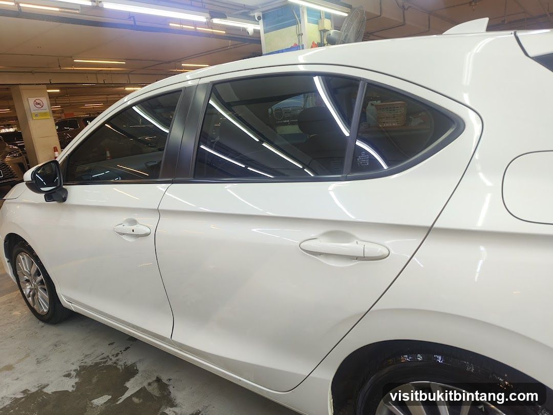 White Car in Parking Garage