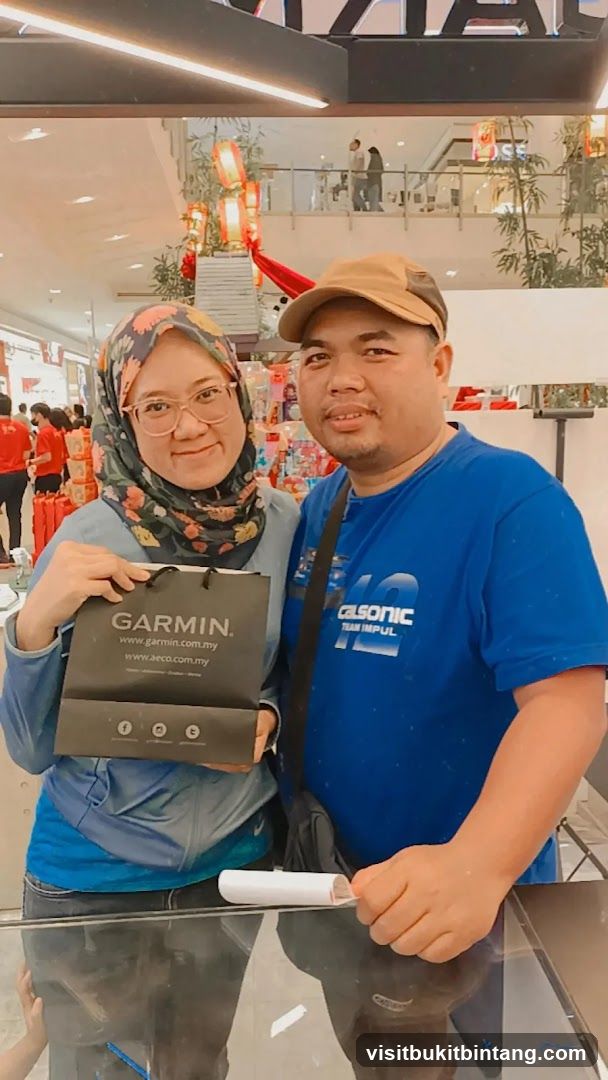 Couple with Garmin Bag