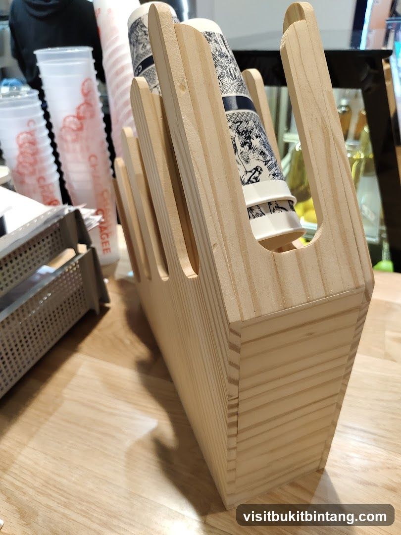 Wooden cup holder with stacked cups