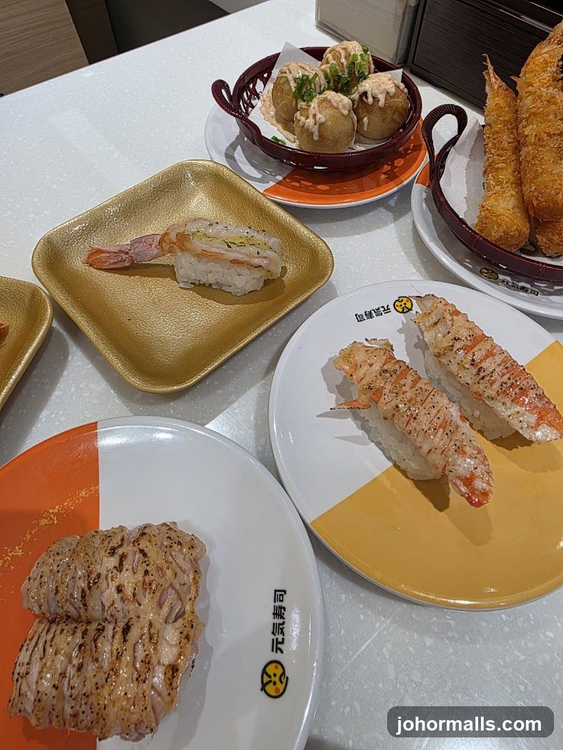 Assortment of Sushi and Fried Foods