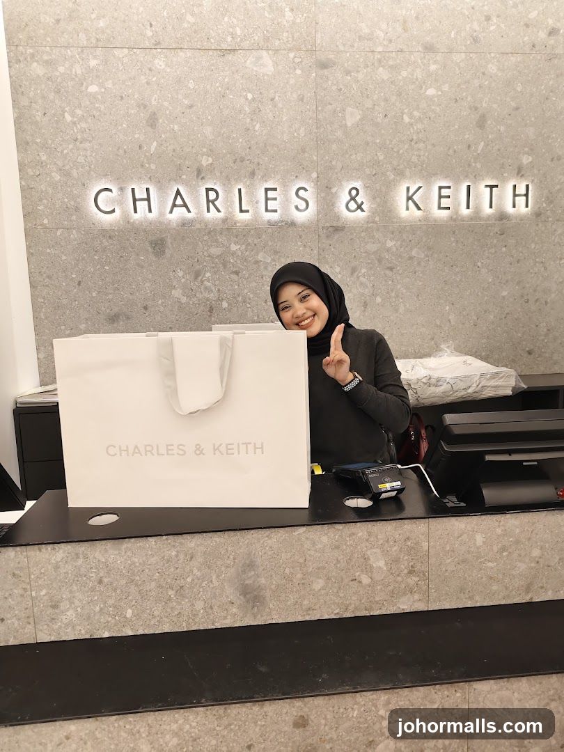 Woman with Shopping Bag at Charles & Keith