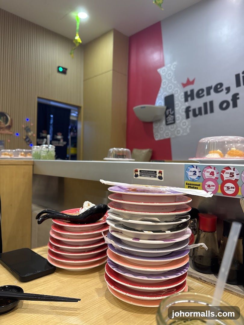 Sushi Restaurant Interior with Stacked Plates